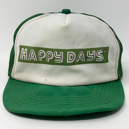 Vintage green trucker hat with 'HAPPY DAYS' logo on front, snapback closure, vibrant retro style