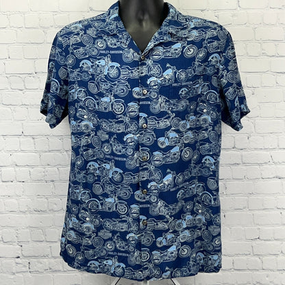 Harley Davidson blue short-sleeve shirt featuring motorcycle graphic prints in a detailed front view