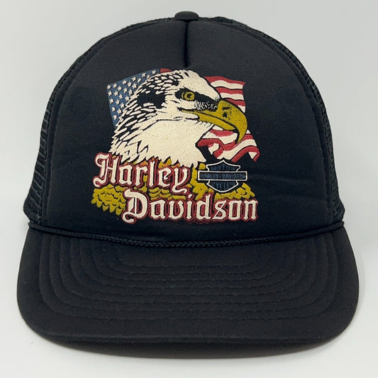 Black Harley Davidson cap featuring an eagle design with American flags and logo detail on the front