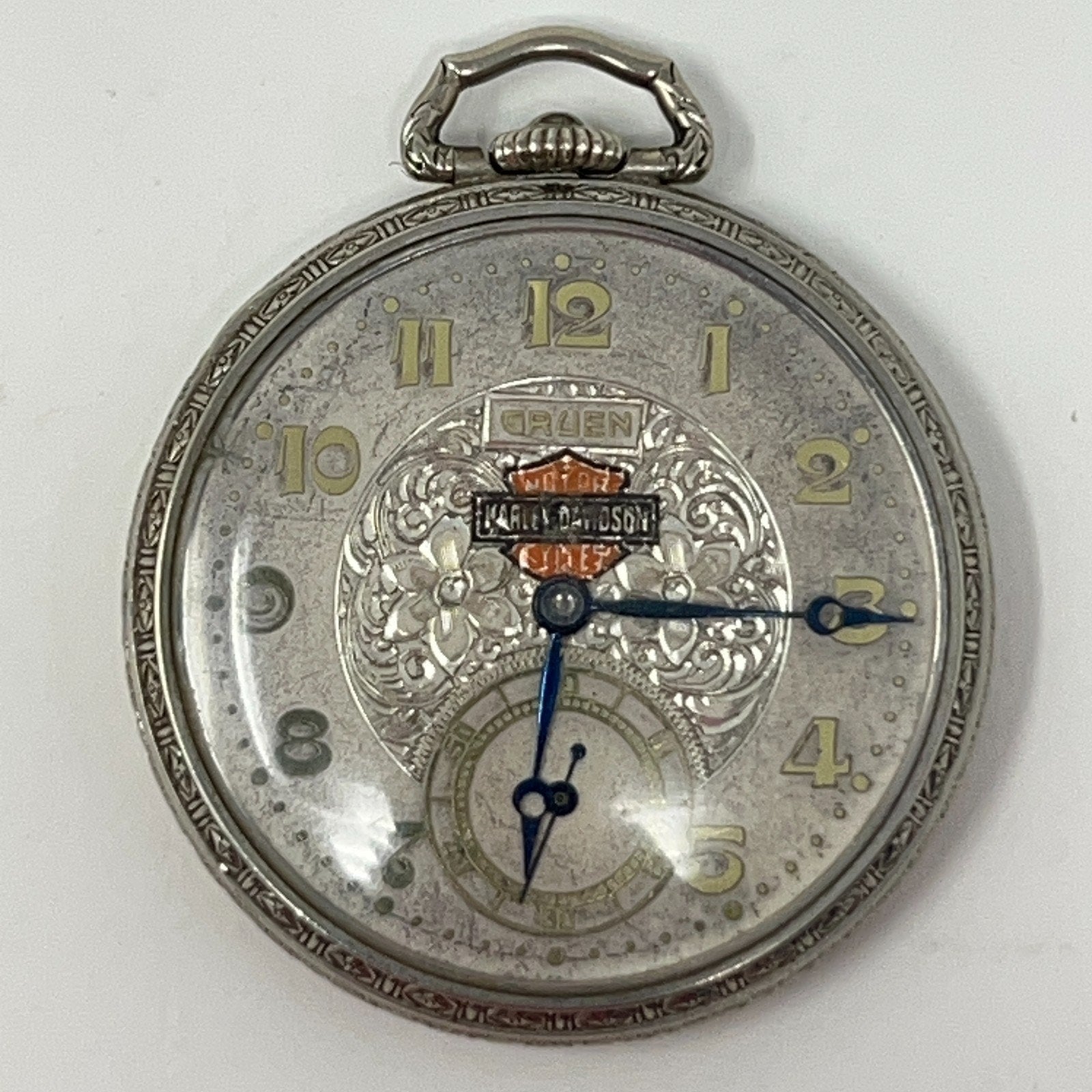 Gruen Harley Davidson Silver Pocket Watch with Floral Design and Gold Numerals, Front View