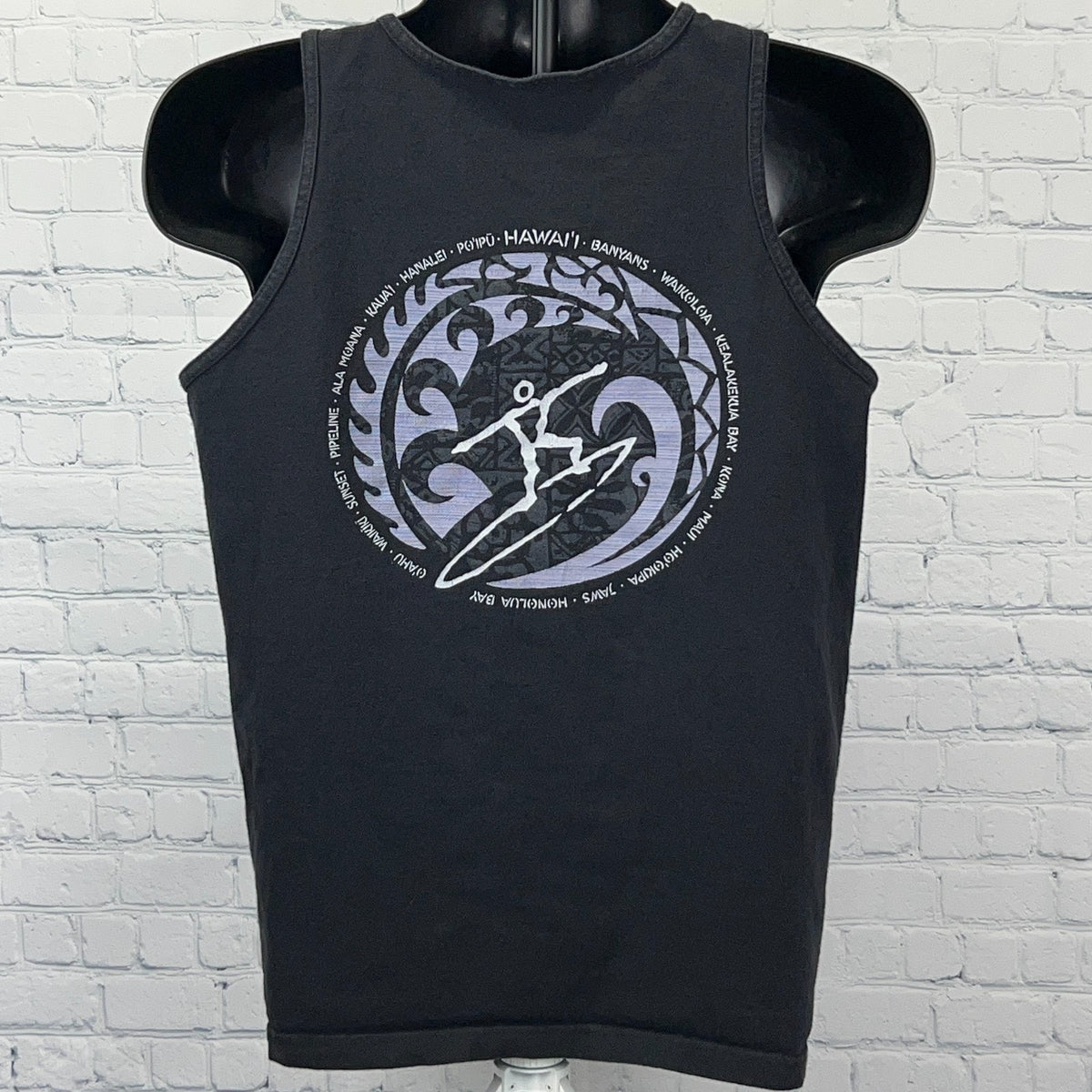 Black sleeveless t-shirt featuring a Hawaii surfer graphic design