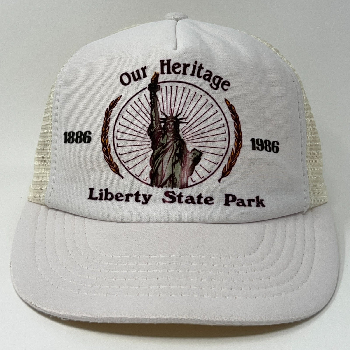 White Vintage Cap with Statue of Liberty Design and 'Liberty State Park' Text on Front