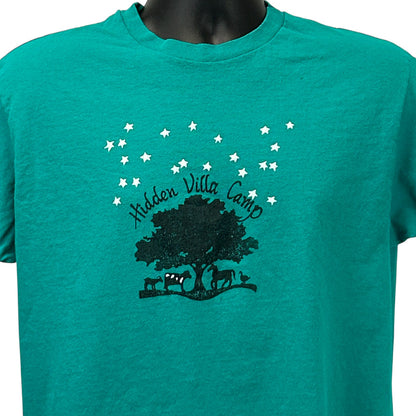 Hanes teal T-Shirt featuring Hidden Villa Camp logo with a tree and stars on the front view