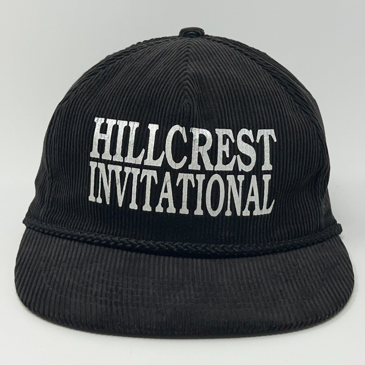 Vintage black cap featuring Hillcrest Invitational embroidered in bold silver letters