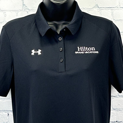 Front view of Hilton Grand Vacations Polo in navy blue with Under Armour logo on the chest