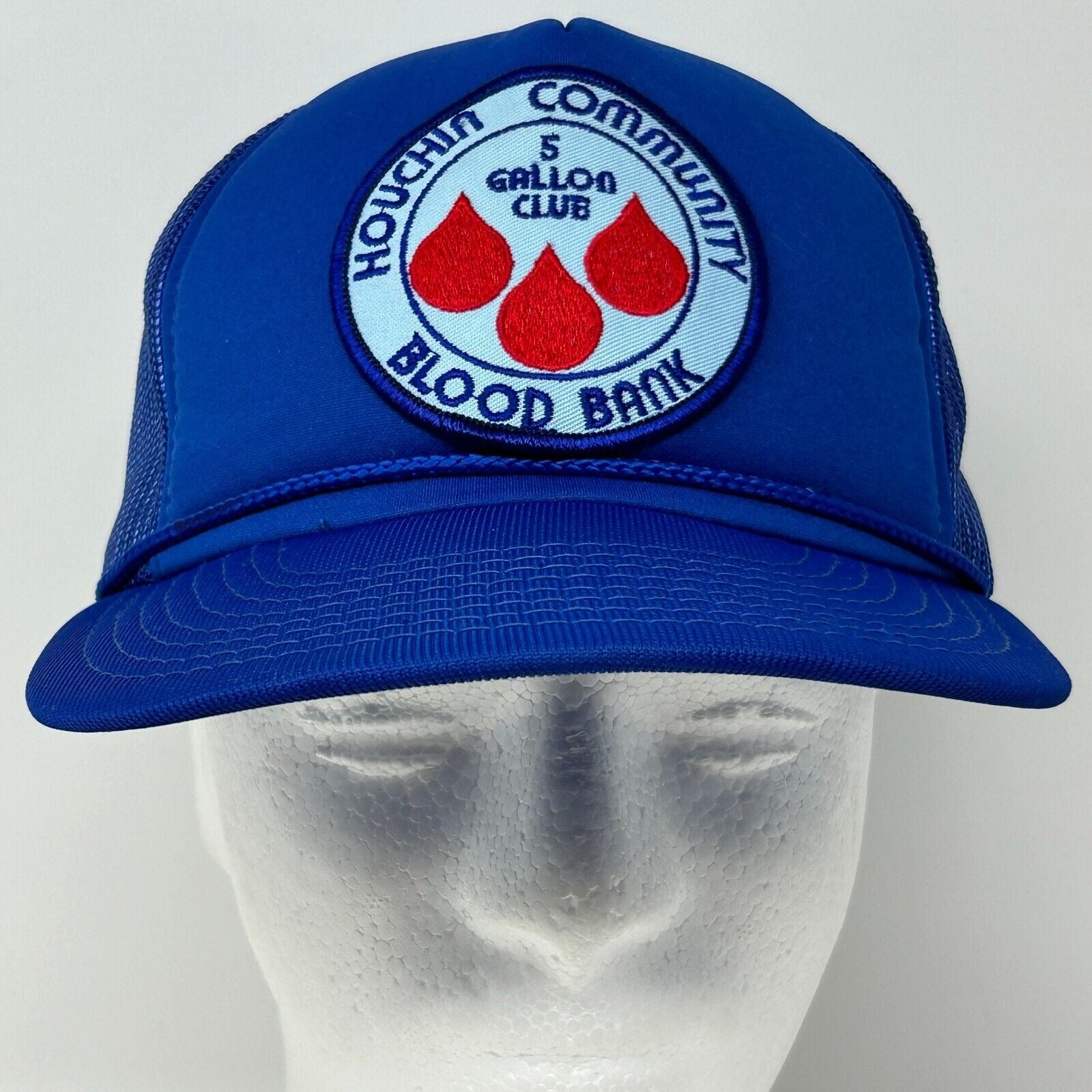 Blue Hanes Houchin Trucker Hat with front logo for blood bank community support