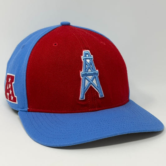 Red and blue Houston Oilers cap featuring a prominent oil tower logo on the front