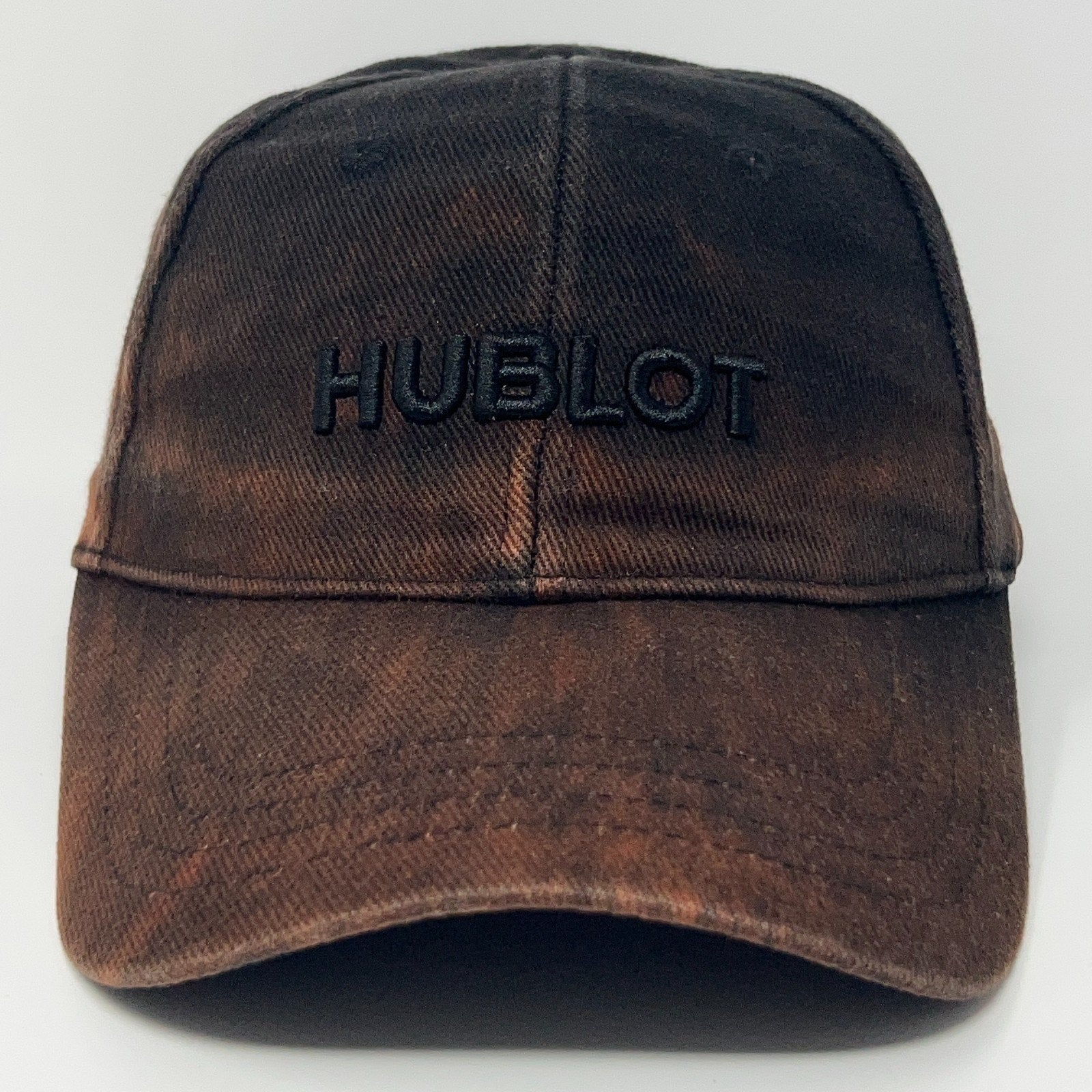 Hublot brown distressed baseball cap with embroidered logo on the front view