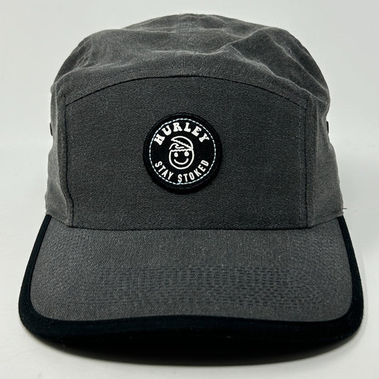 Front view of a gray Hurley Hat featuring a round logo patch with 'Stay Stoked' text.