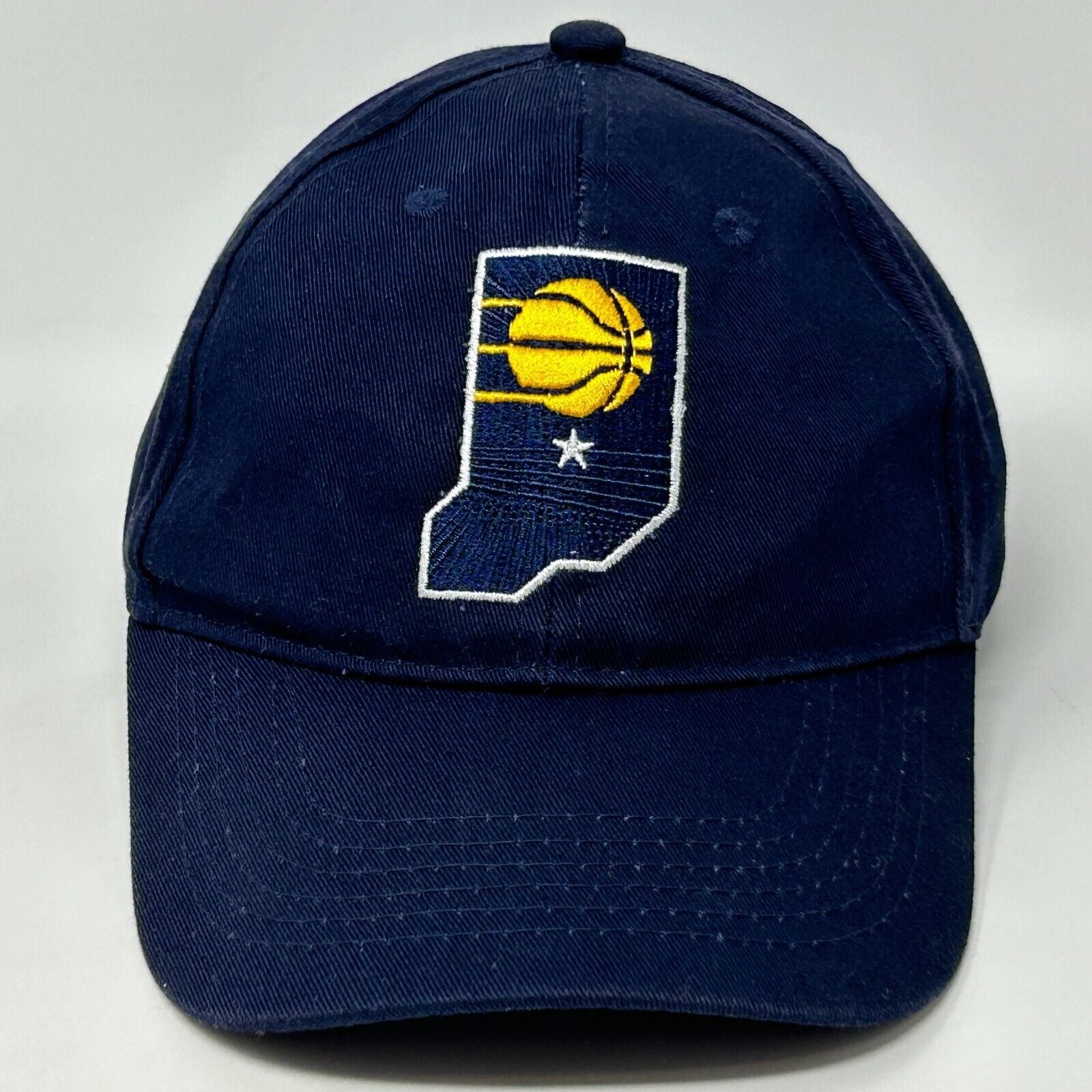 Navy Indiana Pacers cap featuring an embroidered state logo with basketball design