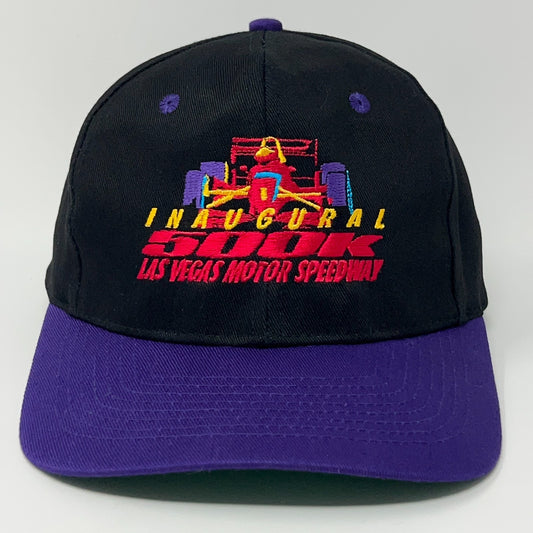 Black IndyCar cap with purple brim featuring colorful inaugural race logo from Las Vegas Motor Speedway