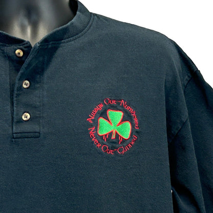 Anvil Irish T-Shirt in black, size medium, featuring a green embroidered shamrock and red text on the front.