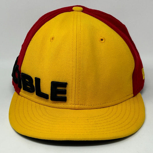 New Era Iron Man Snapback Hat in Yellow and Red with bold lettering on the front