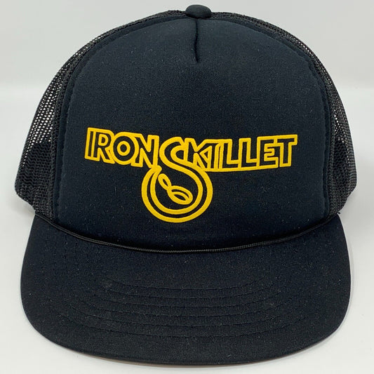 Vintage black trucker hat with yellow Iron Skillet logo on the front for casual wear