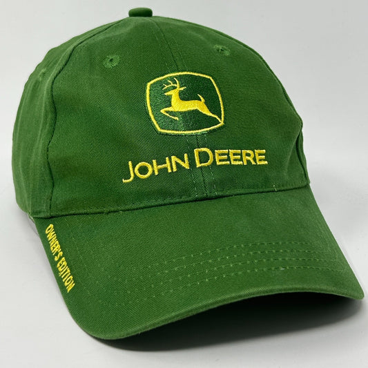 Front view of a green John Deere Hat featuring a yellow logo and embroidered 'Owner's Edition' text