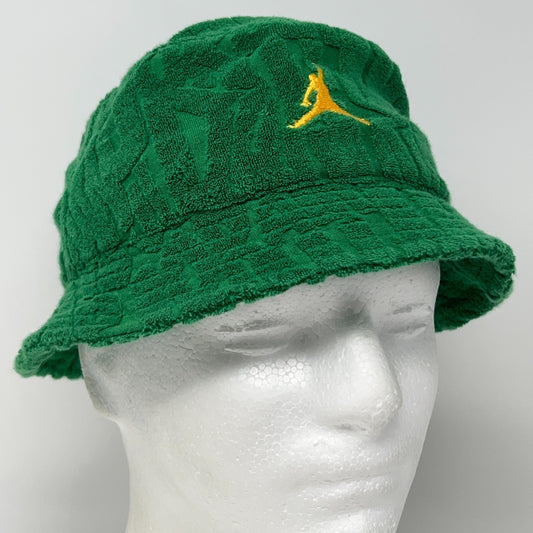 Green Jordan Bucket Hat with textured fabric and yellow Jumpman logo on the front