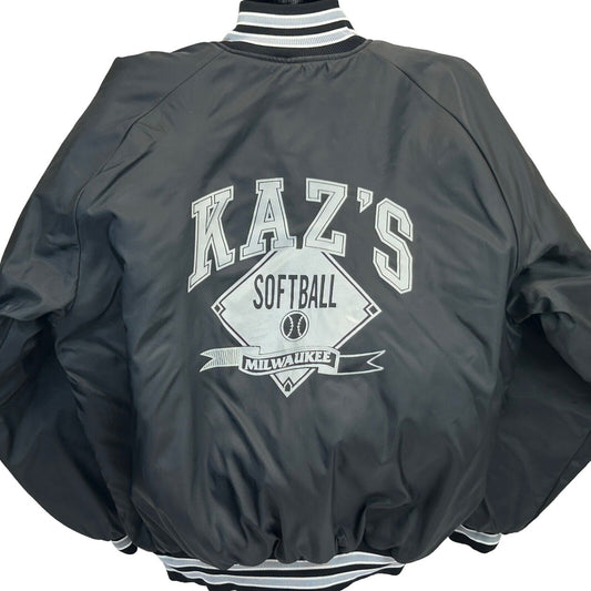 Vintage black Milwaukee bomber jacket featuring 'KAZ'S SOFTBALL' logo on the back