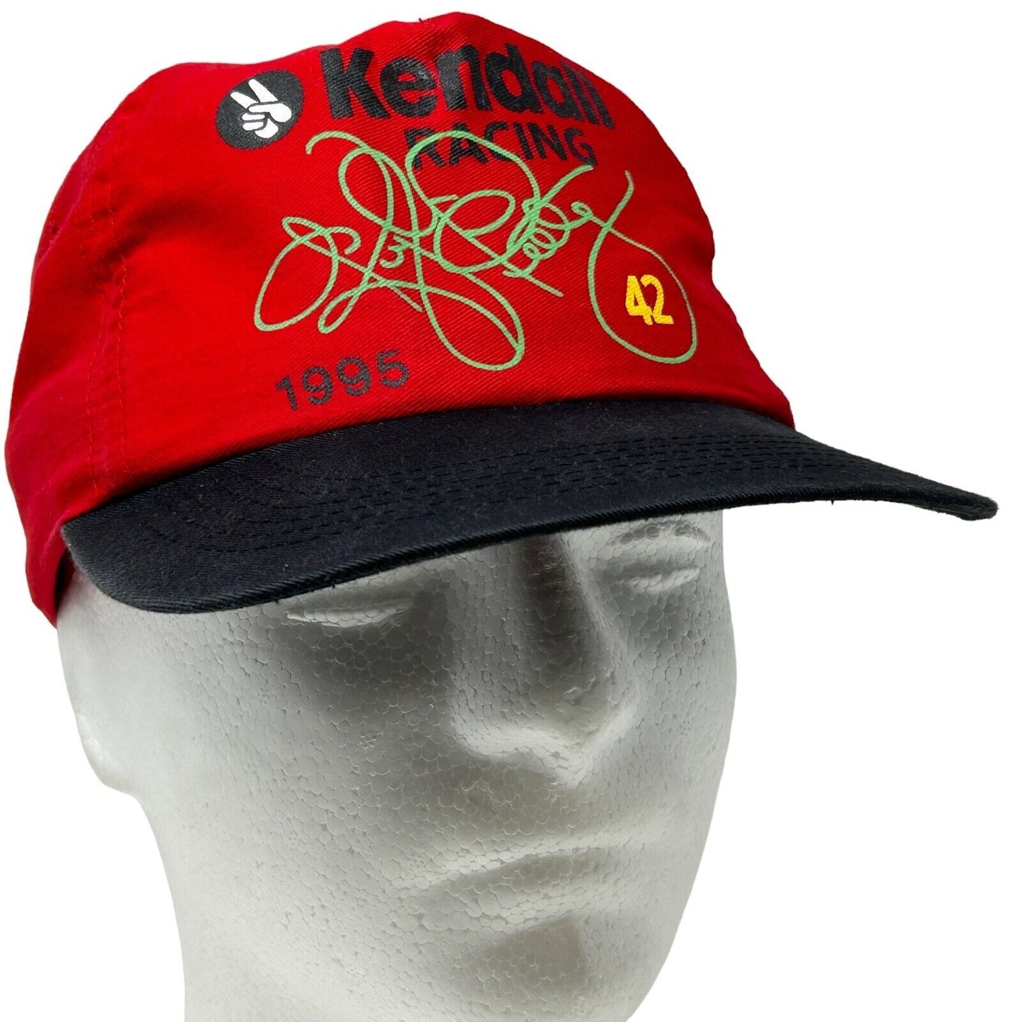 Red NASCAR Kyle Petty cap featuring racing logos and signature, front view with black brim