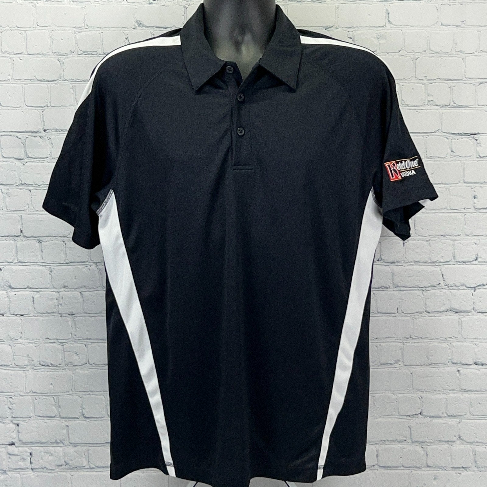 Sport-Tek Black Polo Shirt with White Stripes and Ketel One Vodka Logo on Front