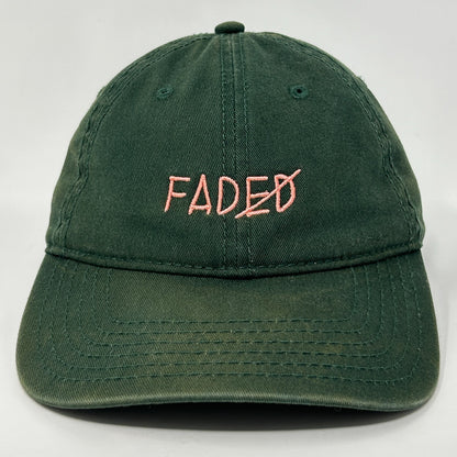 KNYEW Hat in dark green with pink embroidered 'FADED' logo, front view, adjustable size