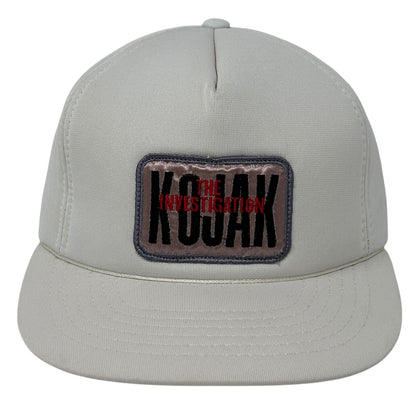 Front view of Vintage Kojak cap in light gray featuring 'THE INVESTIGATION' patch