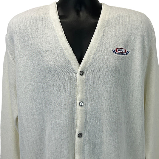 Front view of Pinnacle Kraft Sweater in cream with logo patch and button closure