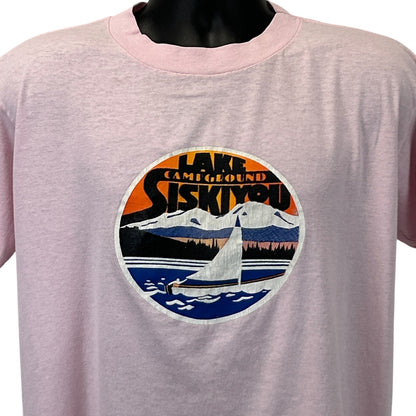 Light pink Vintage T-Shirt featuring Lake Siskiyou graphic on the front with a sailboat and mountains