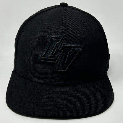 Black New Era Las Vegas Aviators Hat with raised LV logo on the front view