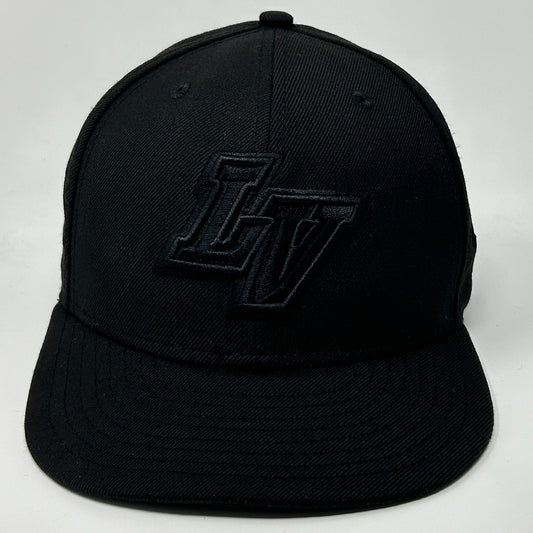 Black New Era Las Vegas Aviators Hat with raised LV logo on the front view
