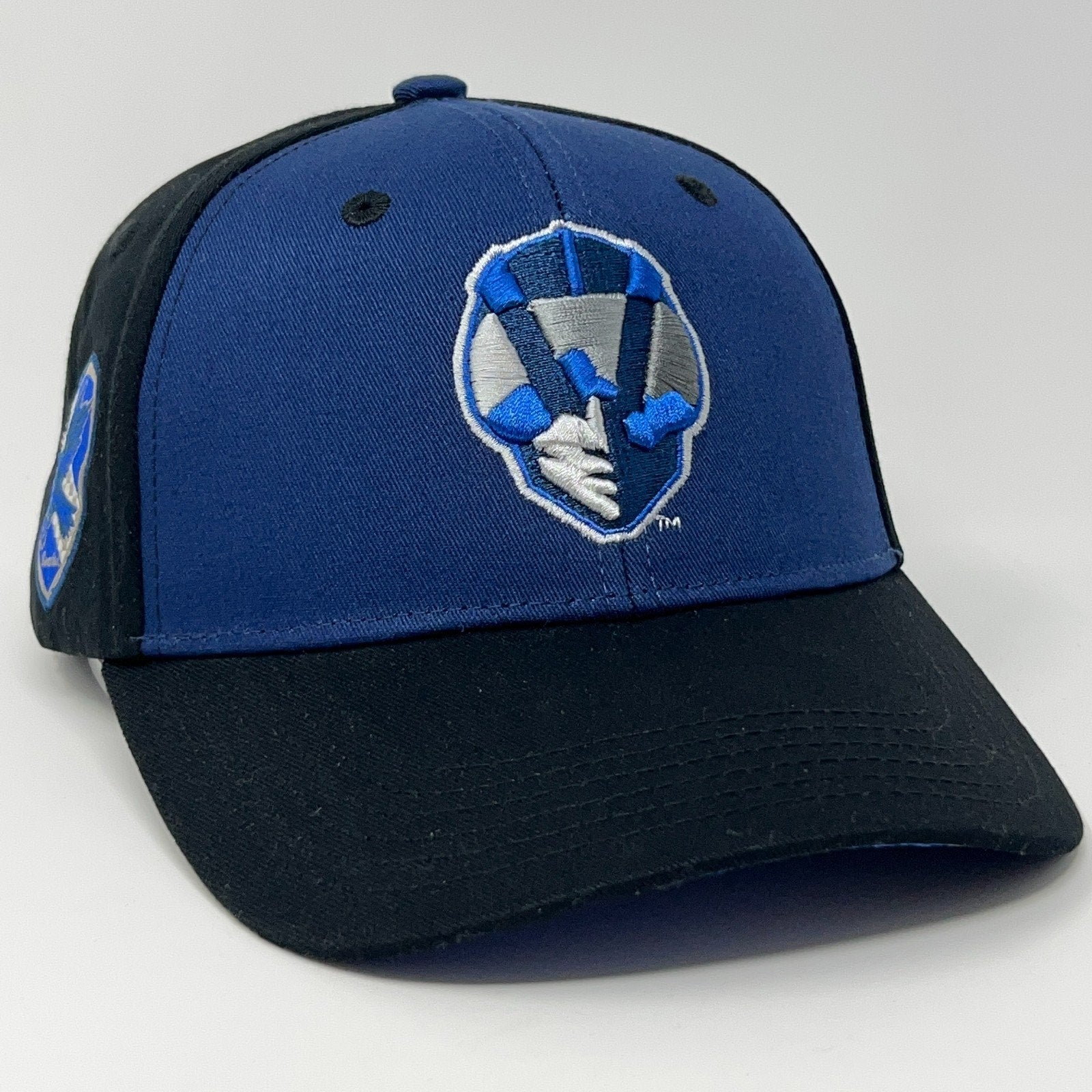 Front view of Las Vegas Aviators Hat in navy blue with logo featuring crossed hands for baseball fans