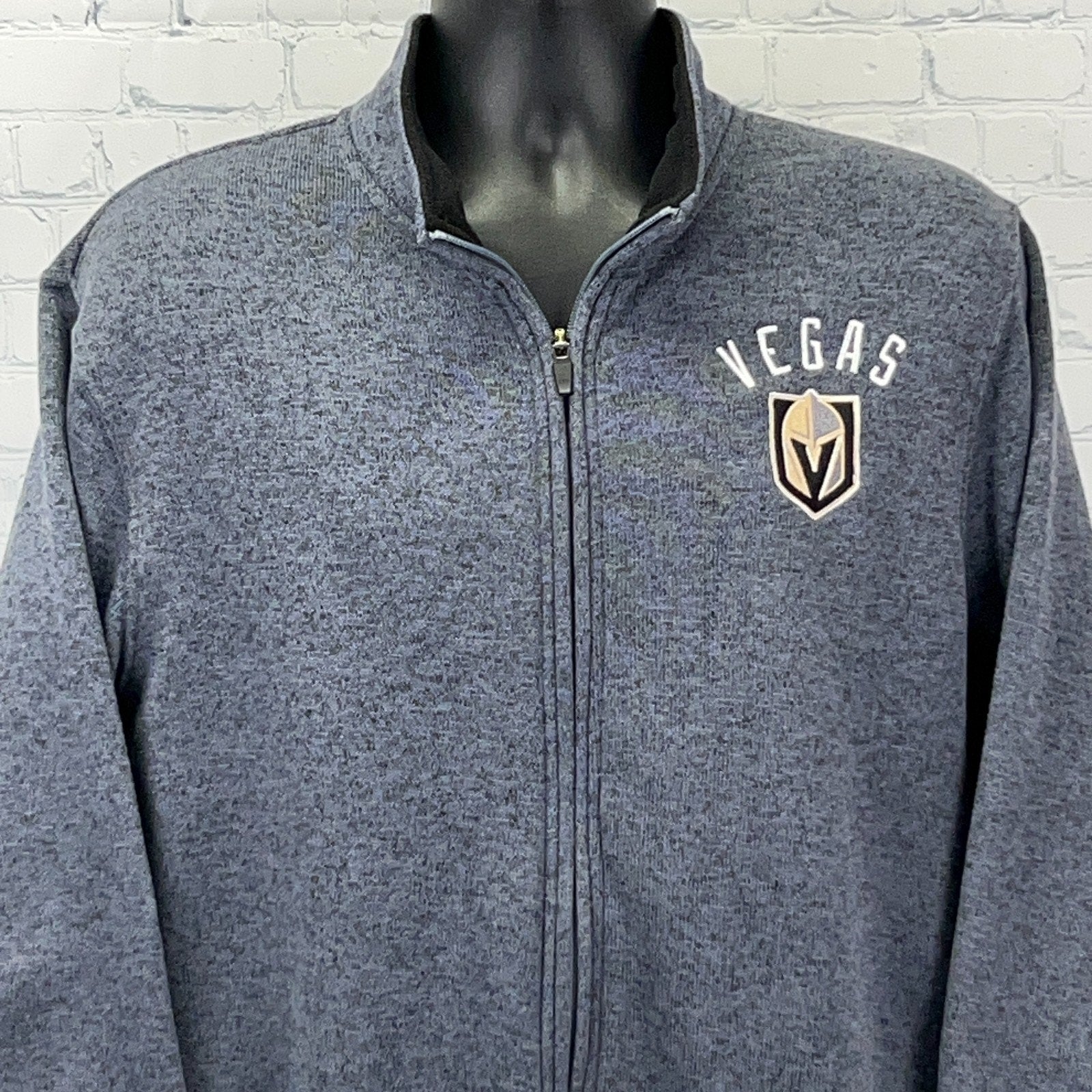 NHL Las Vegas Golden Knights navy zip-up jacket with Vegas logo on left chest, front view