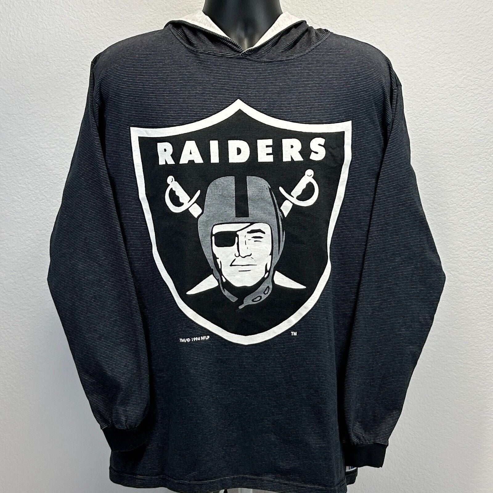 Black Las Vegas Raiders T-Shirt with hoodie and logo graphic on front