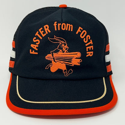 Black vintage hat with orange 'Faster from FOSTER' logo and playful rabbit graphic on front
