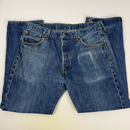 Levis 501 Blue Denim Jeans in Size 32 with Front View Showing Distressed Wash and Classic Logo