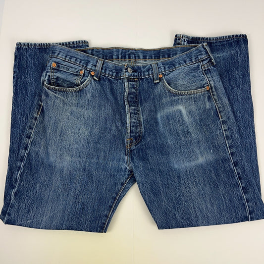 Levis 501 Blue Denim Jeans in Size 32 with Front View Showing Distressed Wash and Classic Logo