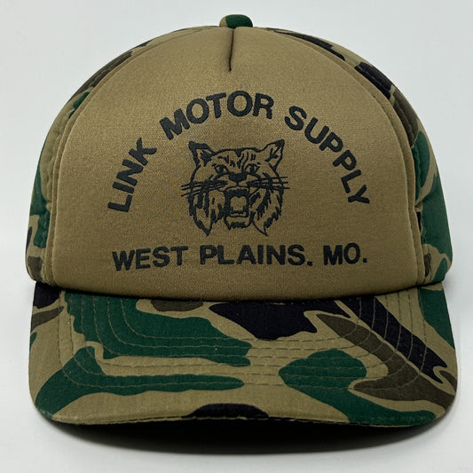 Front view of a Vintage Hat in camouflage with Link Motor Supply logo from West Plains, MO