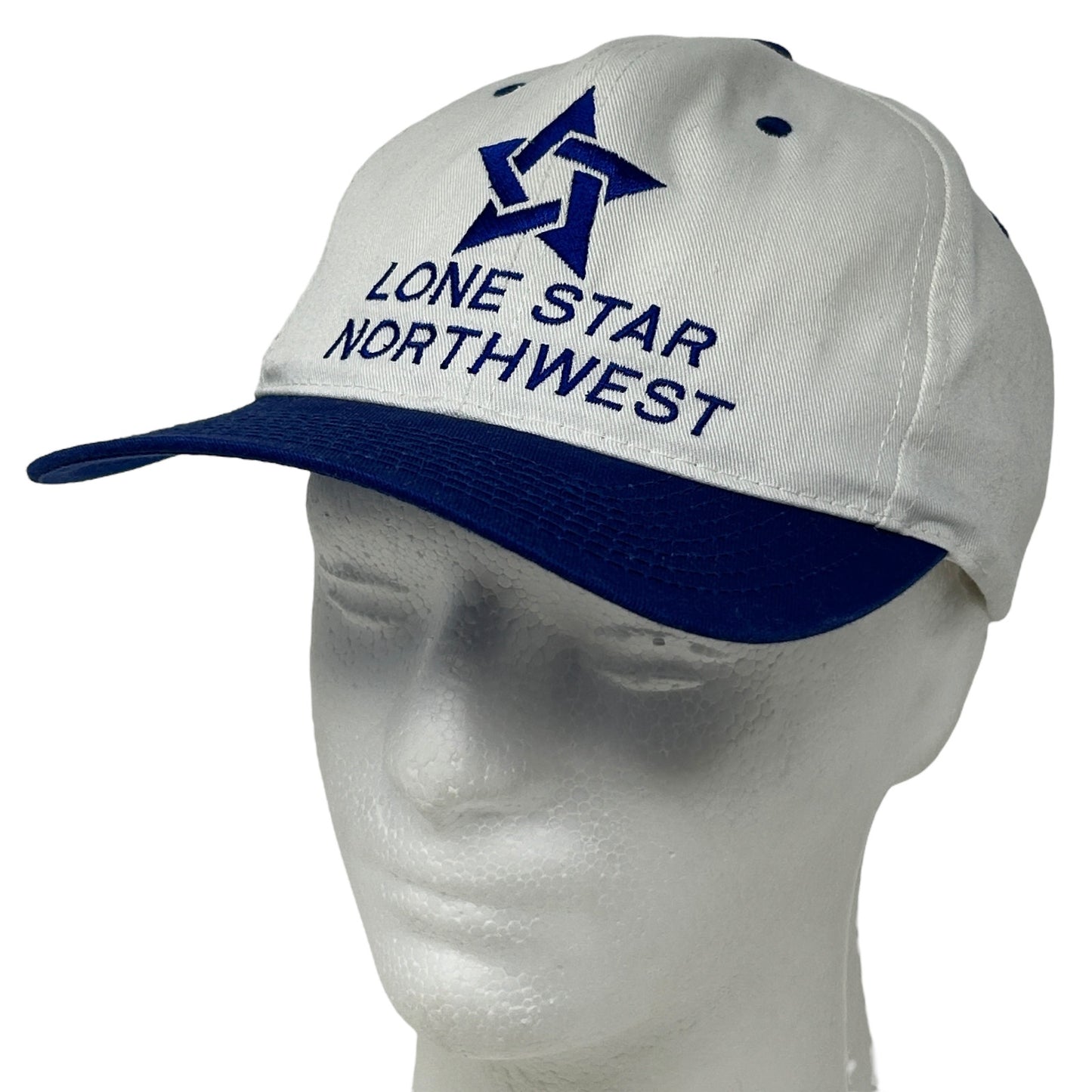 Vintage white baseball cap with blue brim, featuring Lone Star Northwest logo on the front