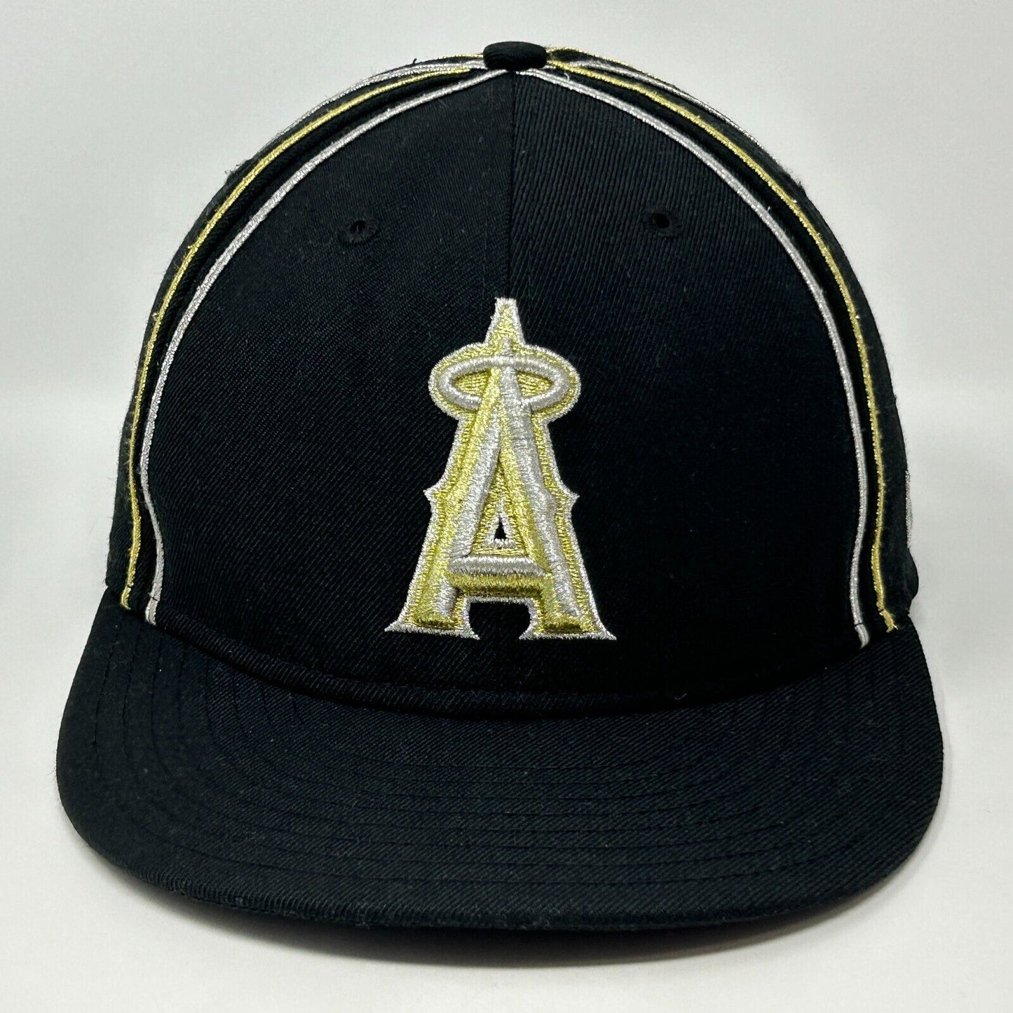 Front view of New Era Los Angeles Angels cap in black with yellow accents and embroidered logo