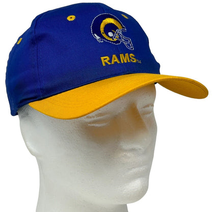 Vintage blue and yellow Los Angeles Rams cap with logo on the front and adjustable back