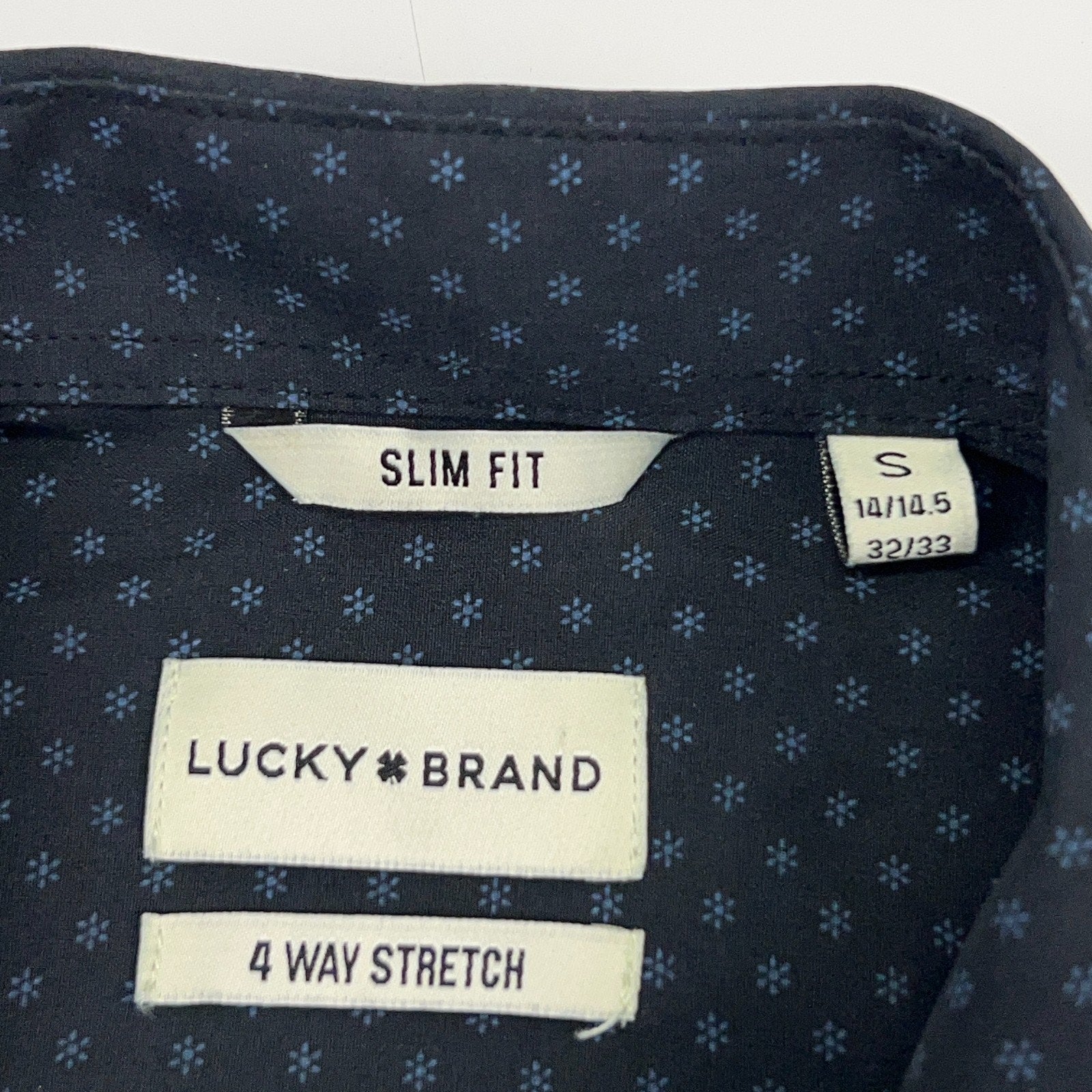 Lucky Brand long sleeve shirt in navy with a slim fit design, size S, showcasing 4-way stretch fabric