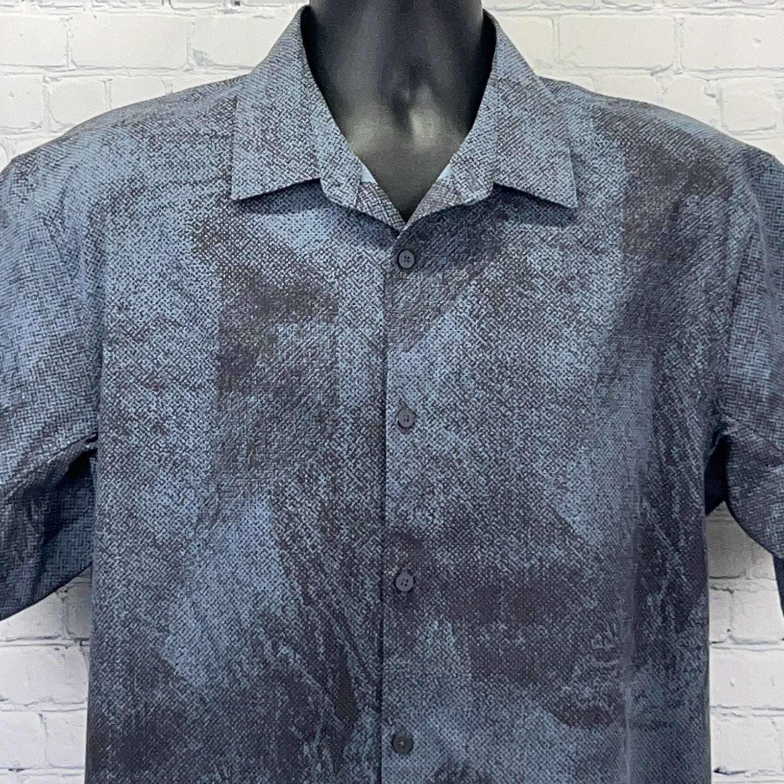 Lululemon Men's Short Sleeve Button-Up Shirt in Blue with Unique Texture and Front View