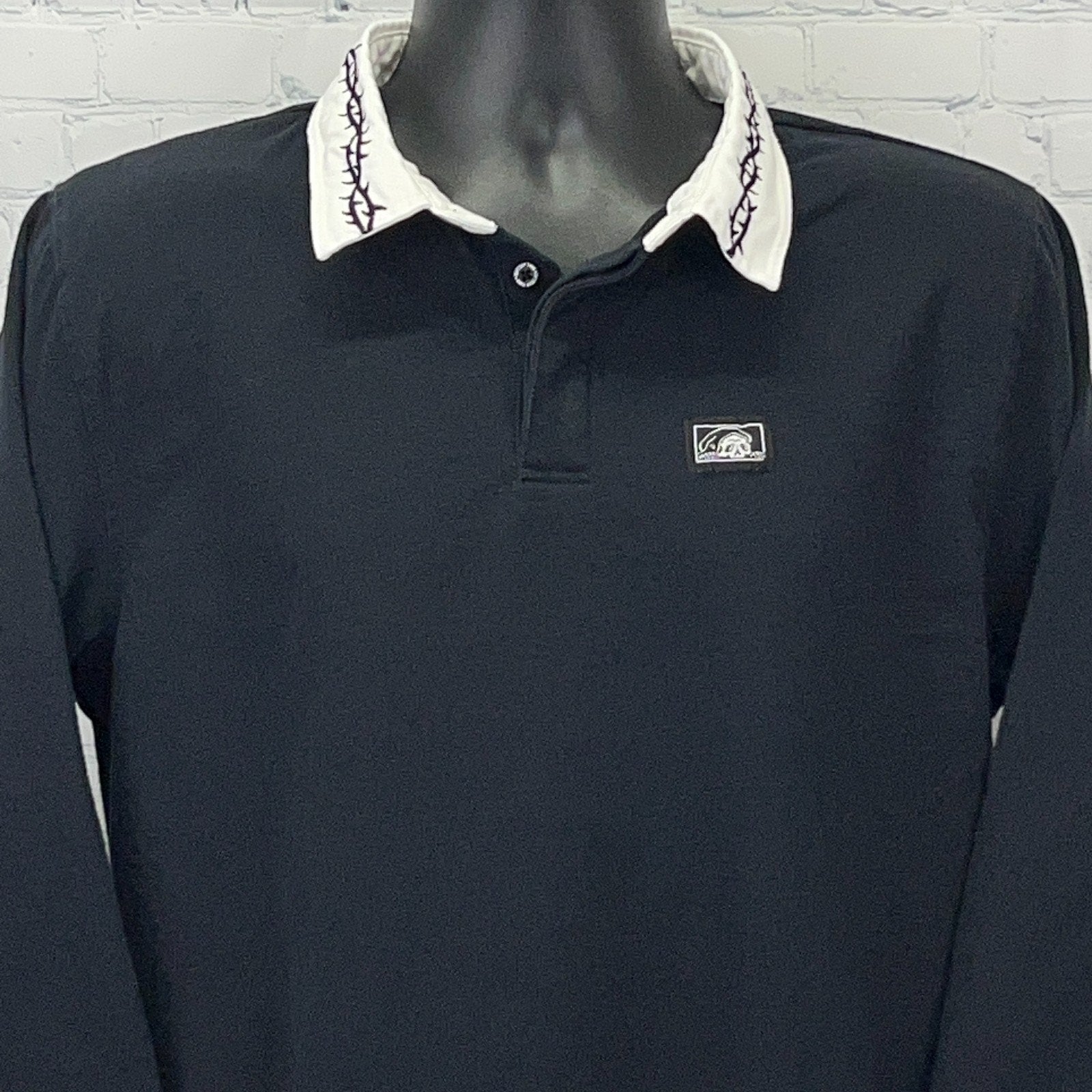 Lurking Class Black Long Sleeve Polo Shirt with Unique White Collar Design and Logo Detail