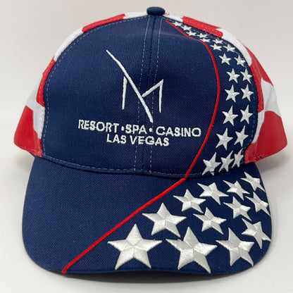 M Resort Hat in navy blue with red and white star accents, featuring logo and casino details on the front