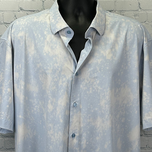 Maceoo Shirt in light blue with a subtle tie-dye pattern, short sleeves, front view with button closure