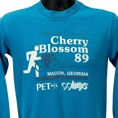 Vintage Macon Georgia Cherry Blossom 89 T-Shirt in turquoise, featuring a running graphic on the front.