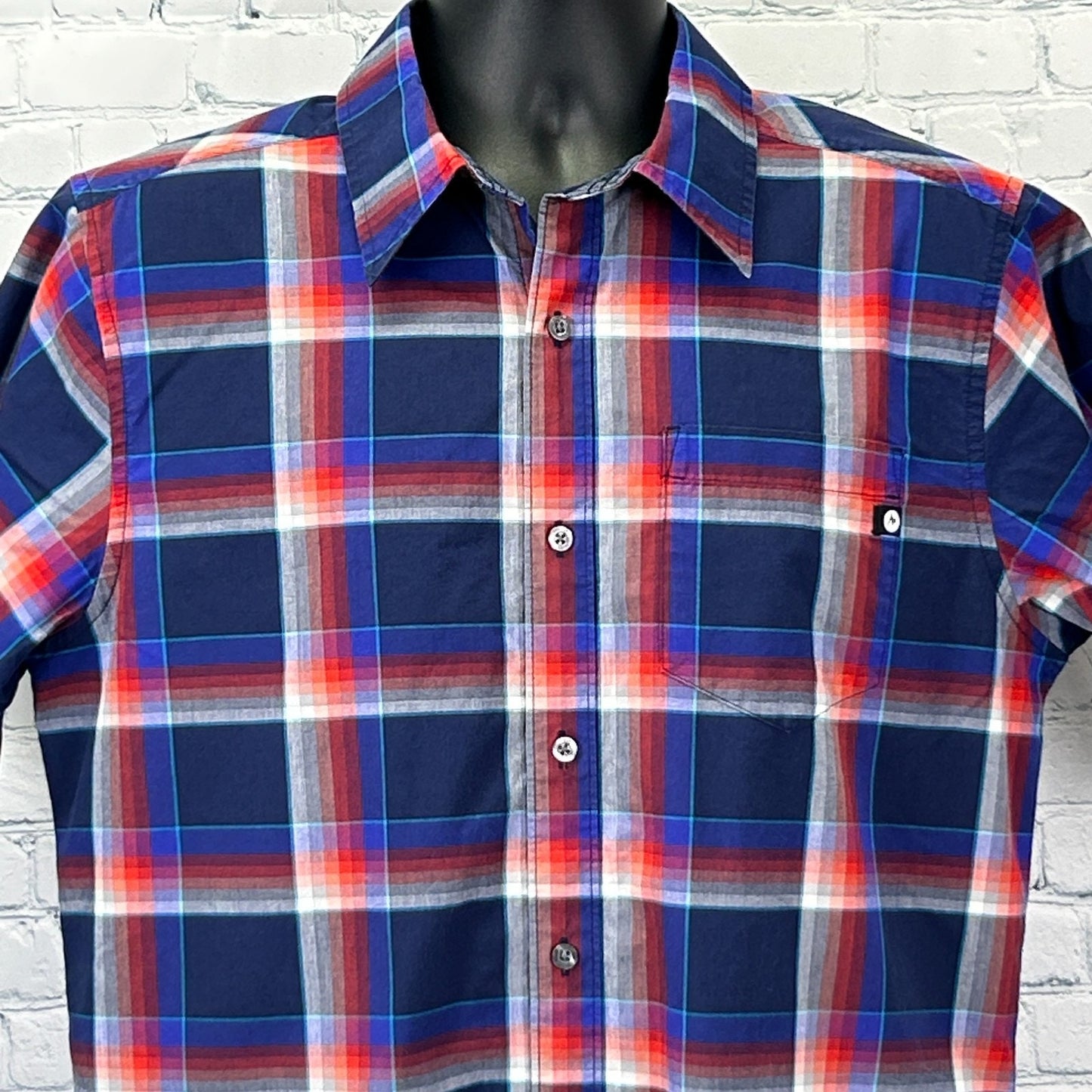 Marmot Shirt in navy and red plaid, size medium, front view with logo on chest pocket