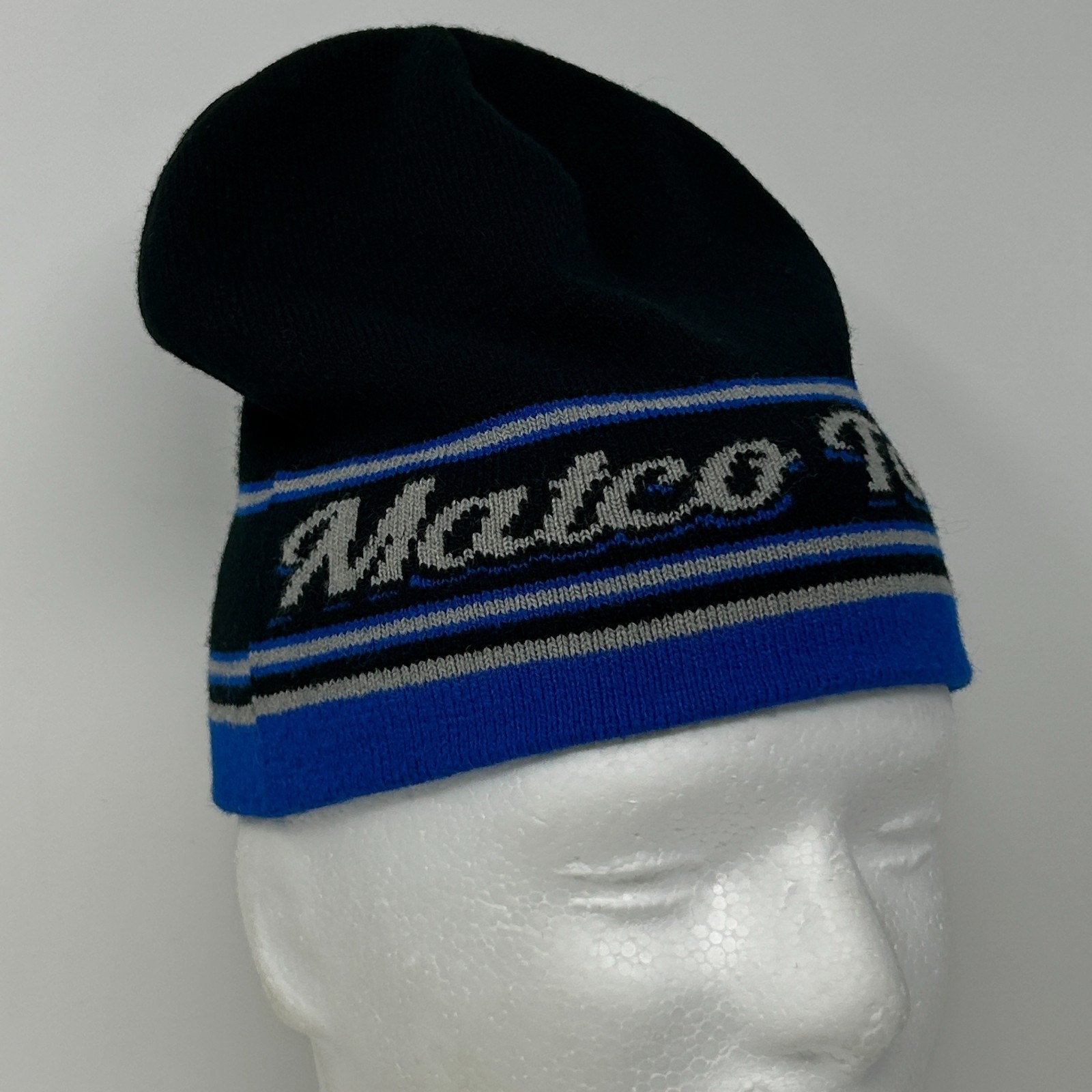 Black and blue Matco Tools knit beanie with logo, featuring a snug fit and striped design