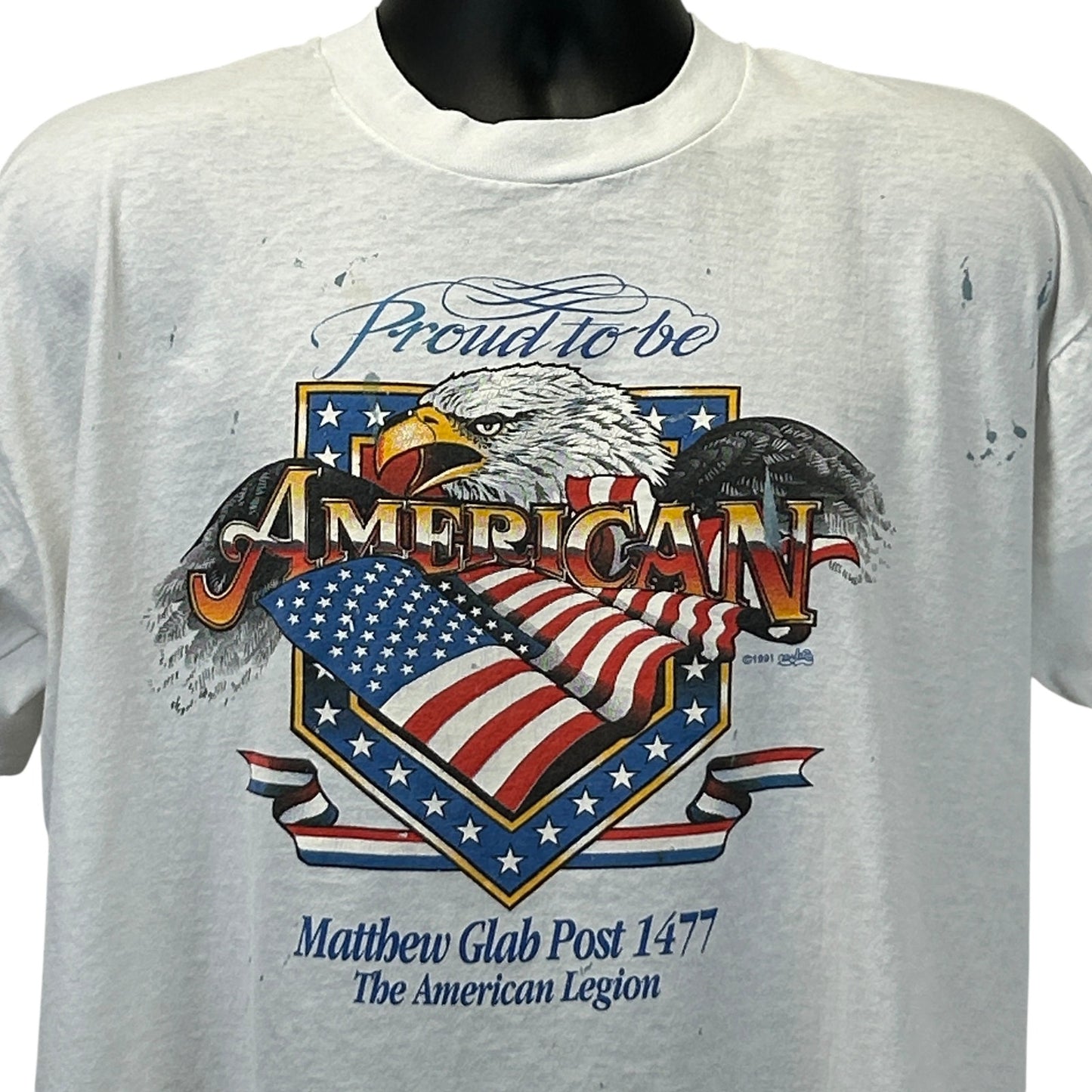 Front view of a vintage American Legion T-Shirt in white with eagle and flag design, size large