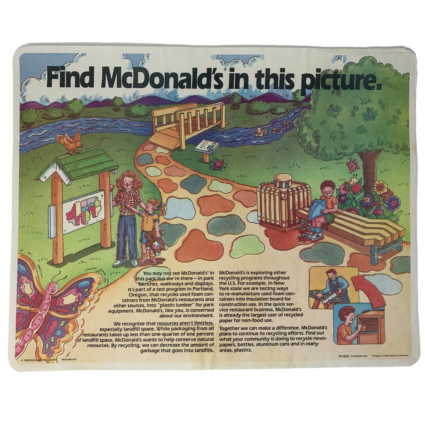 McDonald's educational game mat featuring colorful park scene with children and nature elements