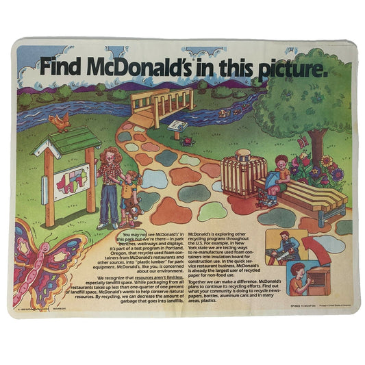McDonald's educational game mat featuring colorful park scene with children and nature elements